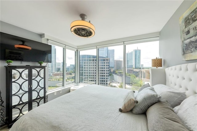 3338 Peachtree Rd NE Unit 1507, Atlanta, GA 30326 - bedroom featuring ceiling fan