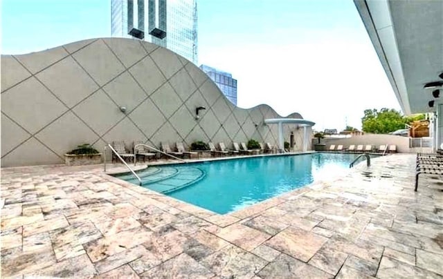 3338 Peachtree Rd NE Unit 1507, Atlanta, GA 30326 - community pool featuring a patio area