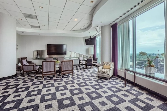 3338 Peachtree Rd NE Unit 1507, Atlanta, GA 30326 - living area featuring healthy amount of natural light and carpet floors
