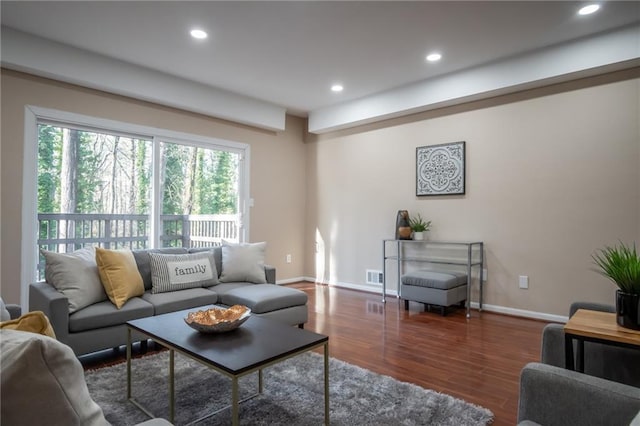 living room featuring dark hardwood / wood-style floors