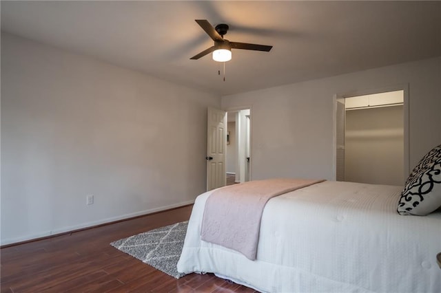 bedroom featuring dark wood-type flooring and ceiling fan