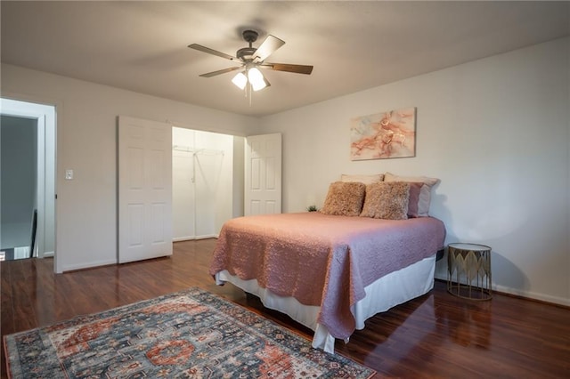 bedroom featuring ceiling fan and dark hardwood / wood-style floors