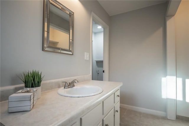 bathroom featuring vanity and tile patterned flooring