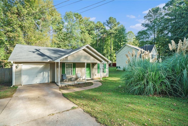 ranch-style house featuring a front yard, a garage, and a porch