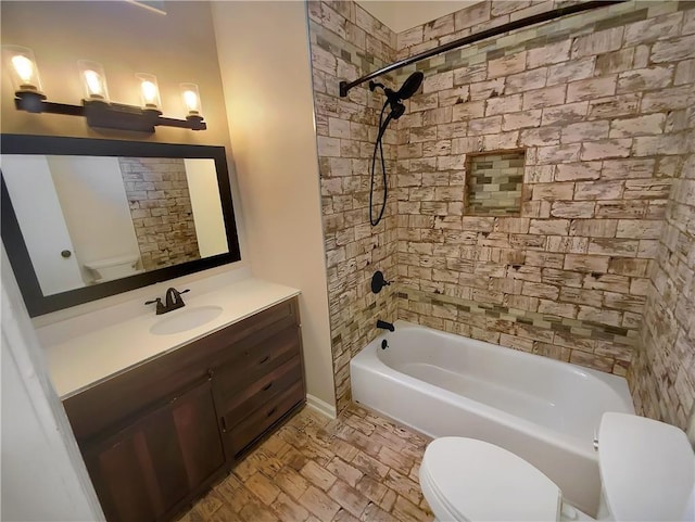 full bathroom featuring vanity, toilet, and tub / shower combination