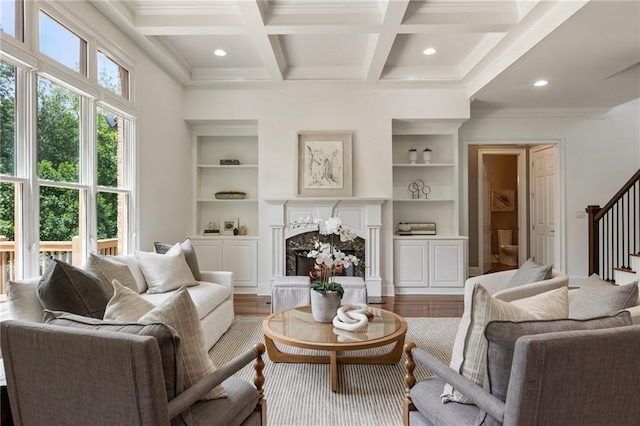 16720 Quayside Dr, Alpharetta, GA 30004 - living room featuring stairway, beamed ceiling, built in features, coffered ceiling, and ornamental molding