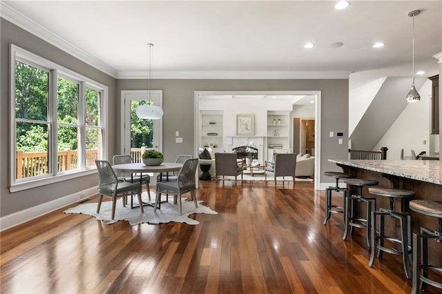 16720 Quayside Dr, Alpharetta, GA 30004 - dining area featuring dark wood-type flooring, baseboards, ornamental molding, recessed lighting, and a fireplace