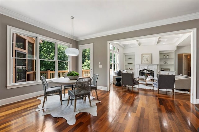 16720 Quayside Dr, Alpharetta, GA 30004 - dining space featuring dark wood-style flooring, baseboards, healthy amount of natural light, crown molding, and built in shelves