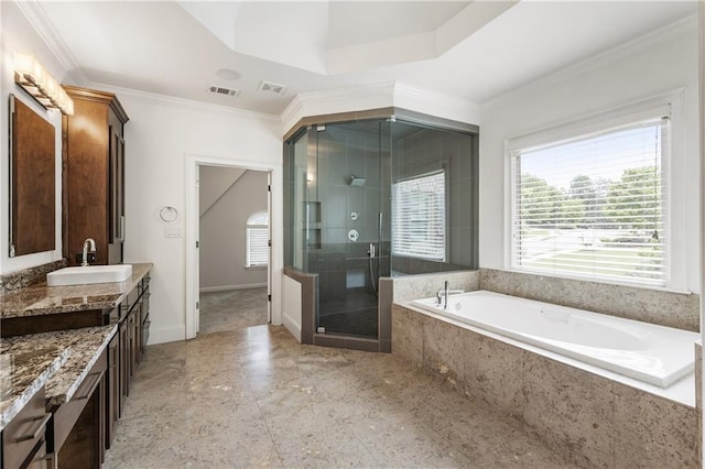 bathroom featuring a shower stall, ornamental molding, a bath, and vanity