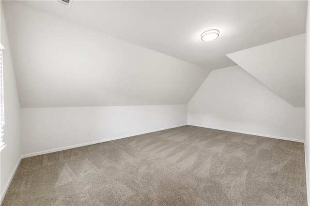 16720 Quayside Dr, Alpharetta, GA 30004 - additional living space with carpet, vaulted ceiling, and baseboards