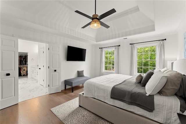 4433 Windsor Oaks Cir, Marietta, GA 30066 - bedroom featuring a raised ceiling, ornamental molding, wood finished floors, and ceiling fan