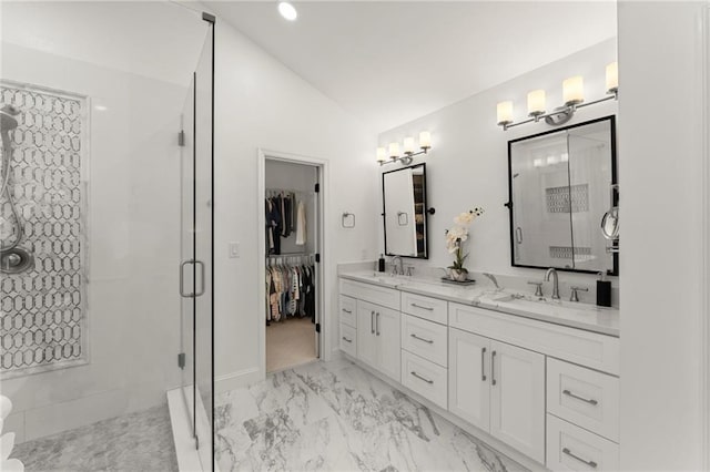 4433 Windsor Oaks Cir, Marietta, GA 30066 - bathroom featuring marble look tiles, a shower stall, vaulted ceiling, and double vanity