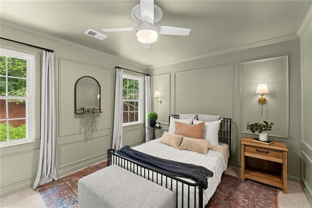 4433 Windsor Oaks Cir, Marietta, GA 30066 - bedroom featuring multiple windows, a decorative wall, ornamental molding, carpet flooring, and a ceiling fan