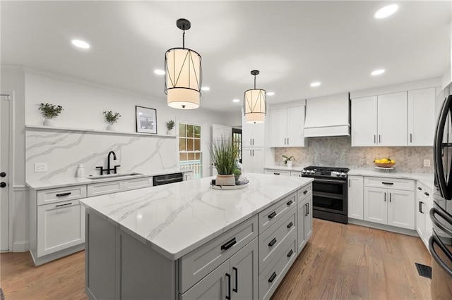4433 Windsor Oaks Cir, Marietta, GA 30066 - kitchen featuring range with two ovens, custom range hood, a sink, a center island, and gray cabinets