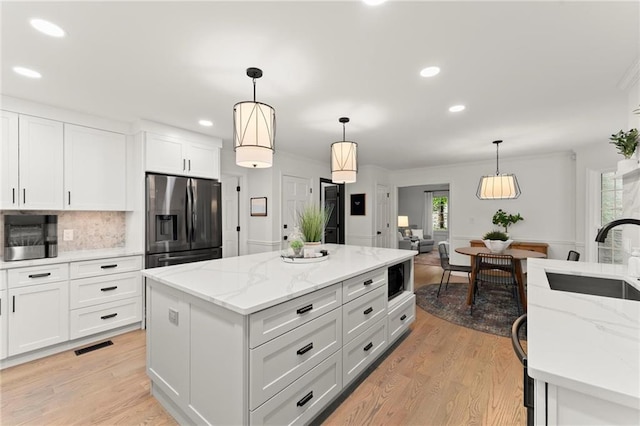 4433 Windsor Oaks Cir, Marietta, GA 30066 - kitchen with range with two ovens, custom exhaust hood, a sink, a kitchen island, and gray cabinetry