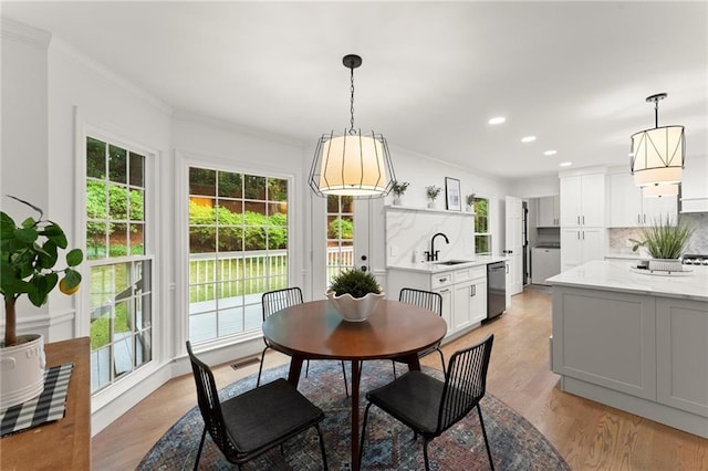4433 Windsor Oaks Cir, Marietta, GA 30066 - kitchen with stainless steel fridge, black microwave, custom range hood, crown molding, and tasteful backsplash