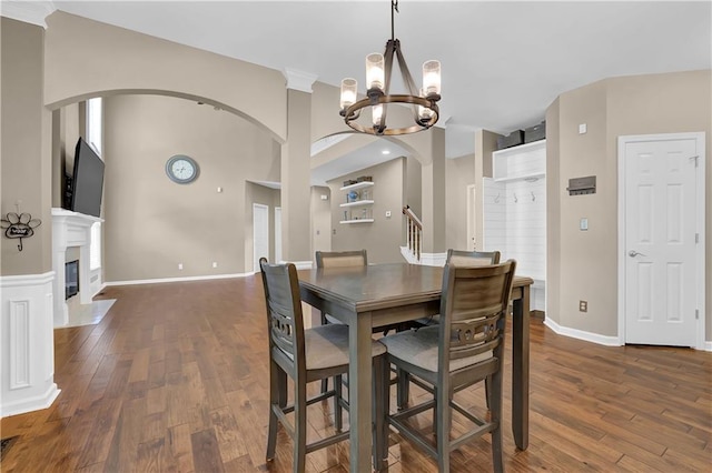 dining area featuring dark hardwood / wood-style floors