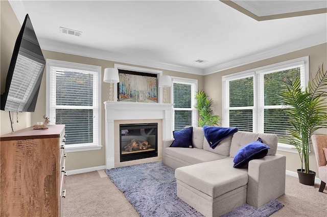 living room with light colored carpet and ornamental molding