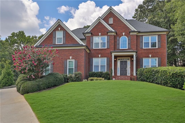 view of front of house with a front lawn