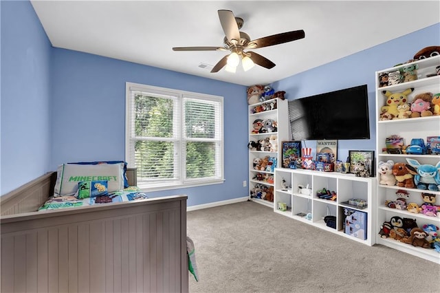 bedroom with ceiling fan and carpet