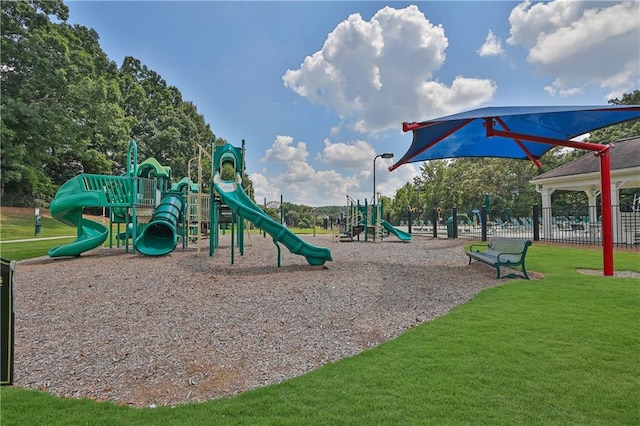 view of playground featuring a yard