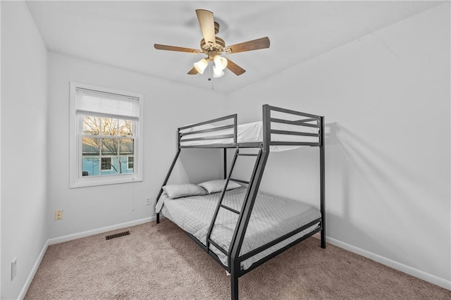 2858 Spring Villa Ln SE, Smyrna, GA 30080 - bedroom featuring carpet flooring, baseboards, and a ceiling fan