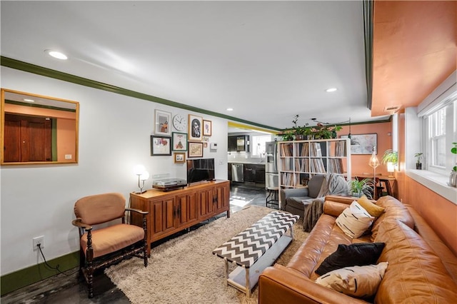 living room with ornamental molding