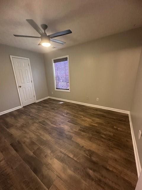 1732 Wyntercreek Ln, Hoschton, GA 30548 - unfurnished room featuring baseboards, ceiling fan, and dark wood-style floors