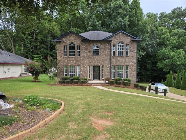 view of front of house with a front lawn