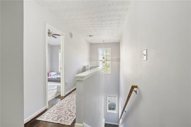 interior space featuring hardwood / wood-style floors and ceiling fan