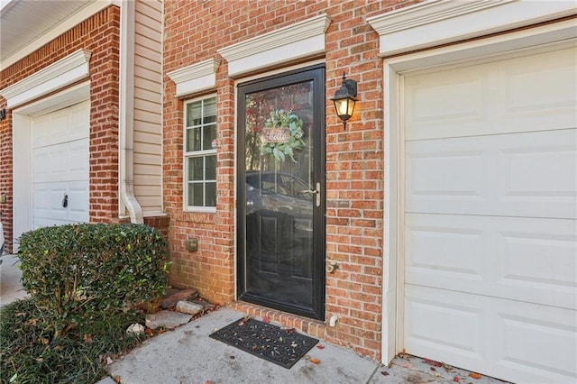 property entrance featuring a garage