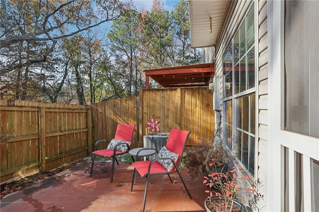 view of patio with central AC unit