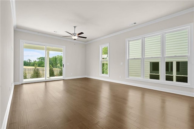636 Silva St, Cumming, GA 30040 - empty room with baseboards, ceiling fan, dark wood-style floors, and crown molding