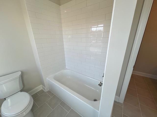 full bathroom with toilet, tile patterned floors, and baseboards