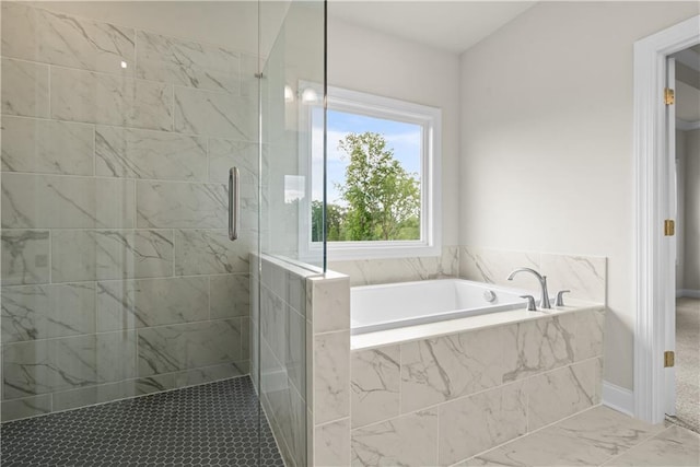 636 Silva St, Cumming, GA 30040 - full bath with a tile shower, a bath, and marble finish floors
