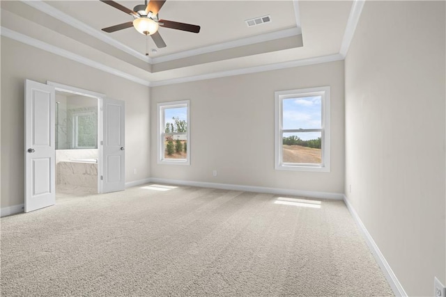 636 Silva St, Cumming, GA 30040 - unfurnished bedroom with carpet, ornamental molding, baseboards, a tray ceiling, and ensuite bath