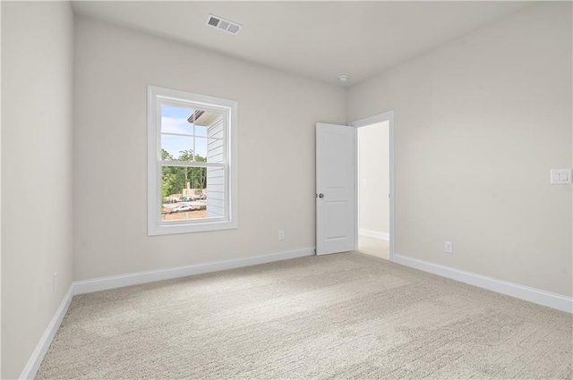 636 Silva St, Cumming, GA 30040 - unfurnished room with light colored carpet and baseboards