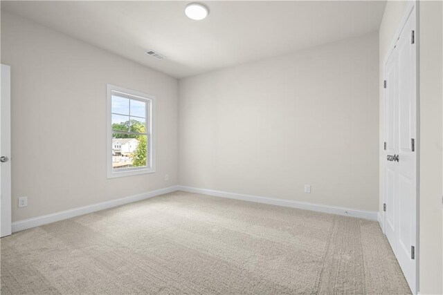 636 Silva St, Cumming, GA 30040 - unfurnished room featuring carpet flooring and baseboards