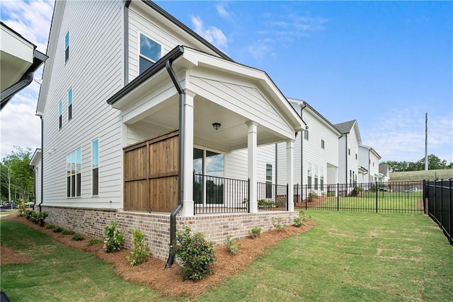 636 Silva St, Cumming, GA 30040 - view of home's exterior featuring brick siding