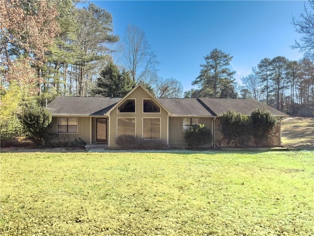 single story home with a front yard