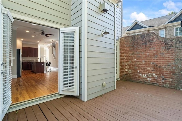 wooden deck featuring sink