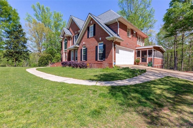 516 Turner Rd, Concord, GA 30206 - view of side of home featuring brick siding, a sunroom, concrete driveway, an attached garage, and a yard