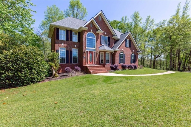 516 Turner Rd, Concord, GA 30206 - view of front of home with brick siding and a front yard