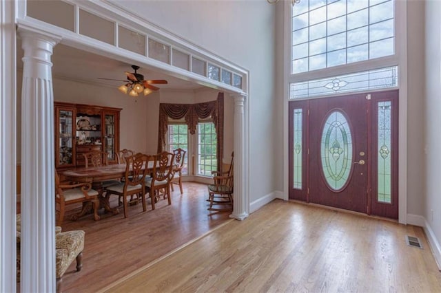 516 Turner Rd, Concord, GA 30206 - entryway with wood finished floors, ceiling fan, baseboards, and a high ceiling