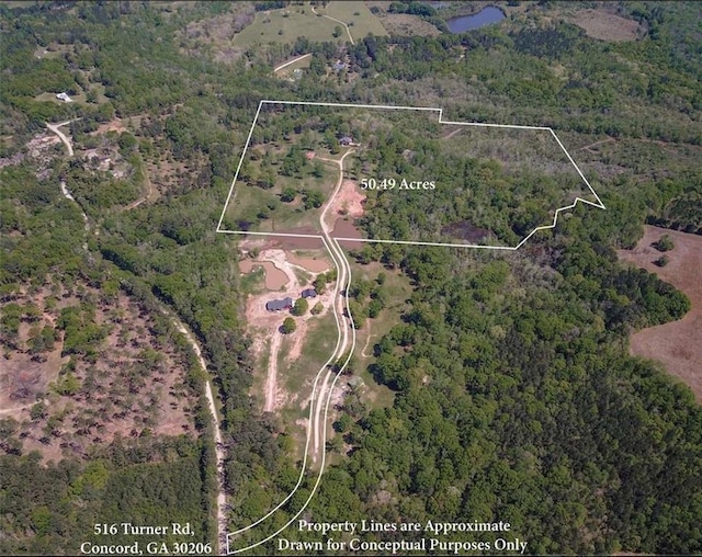 516 Turner Rd, Concord, GA 30206 - aerial overview of property's location with a forest and property boundaries highlighted