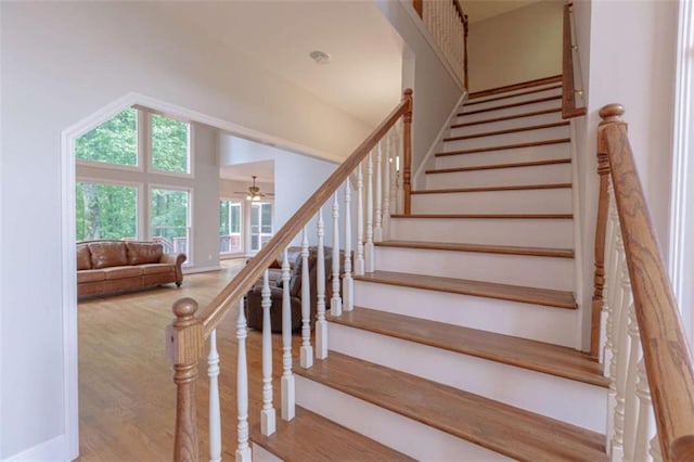 516 Turner Rd, Concord, GA 30206 - stairs with wood finished floors, baseboards, and a ceiling fan