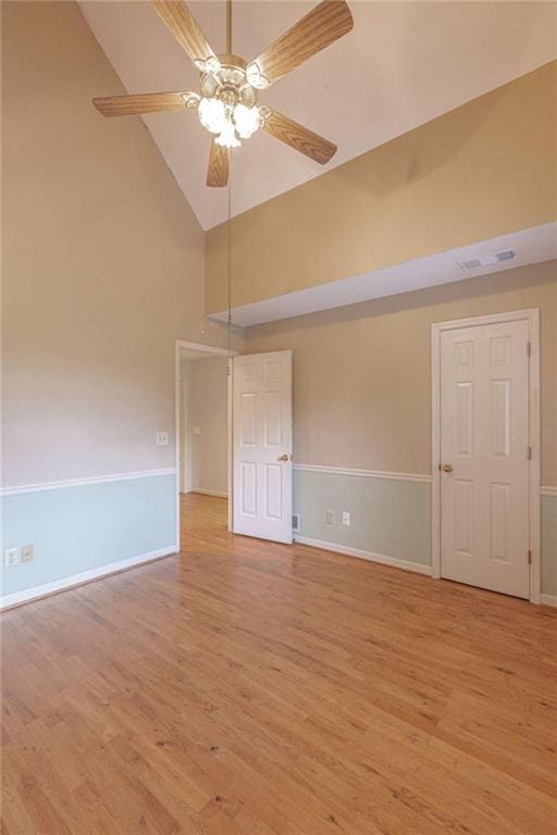 516 Turner Rd, Concord, GA 30206 - spare room with light wood-style flooring, high vaulted ceiling, ceiling fan, and baseboards