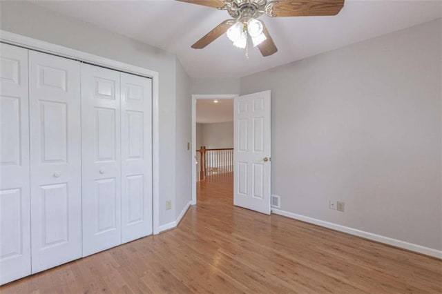 516 Turner Rd, Concord, GA 30206 - unfurnished bedroom featuring baseboards, light wood-style flooring, a closet, and ceiling fan