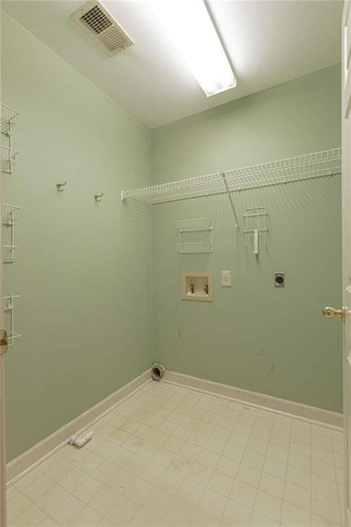 516 Turner Rd, Concord, GA 30206 - laundry room with electric dryer hookup, hookup for a washing machine, and baseboards