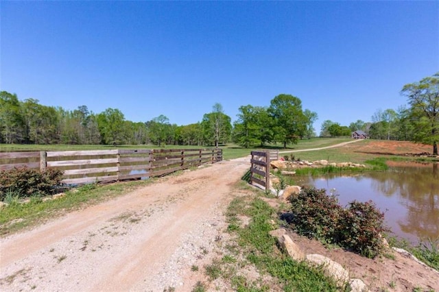 516 Turner Rd, Concord, GA 30206 - view of dirt / gravel road featuring a view of rural / pastoral area and a water view
